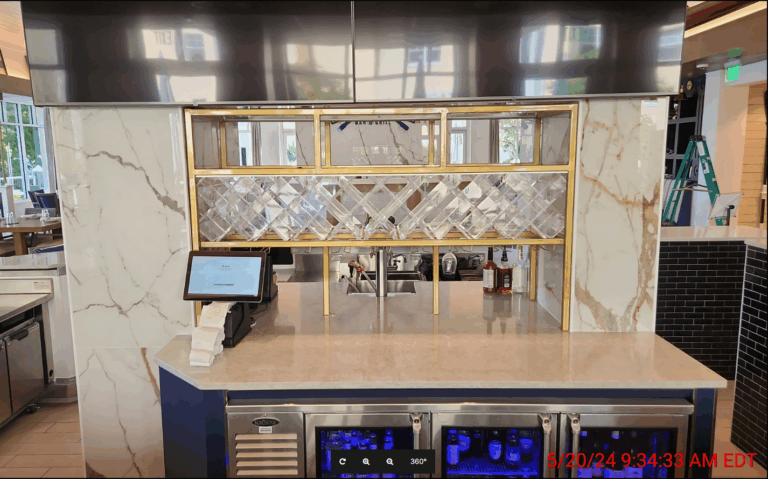 Custom Acrylic Grid Wine Rack by VintageView in a restaurant.