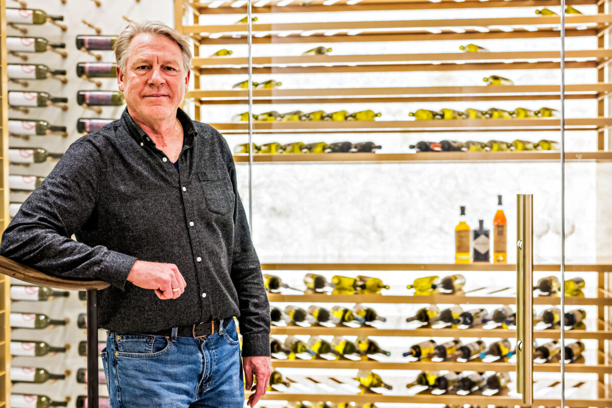 Label-forward wine bottle storage on a custom VintageView Forged racking system, installed by Red Leaf Wine Cellars and Saunas
